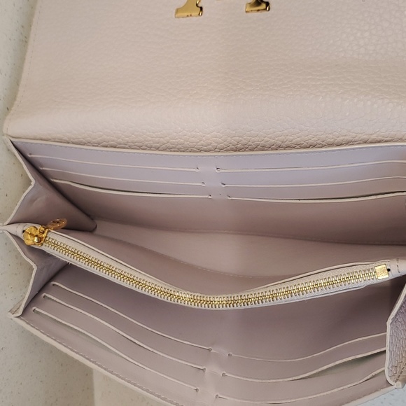 LOUIS VUITTON pebbled leather wallet - Picture 8 of 10